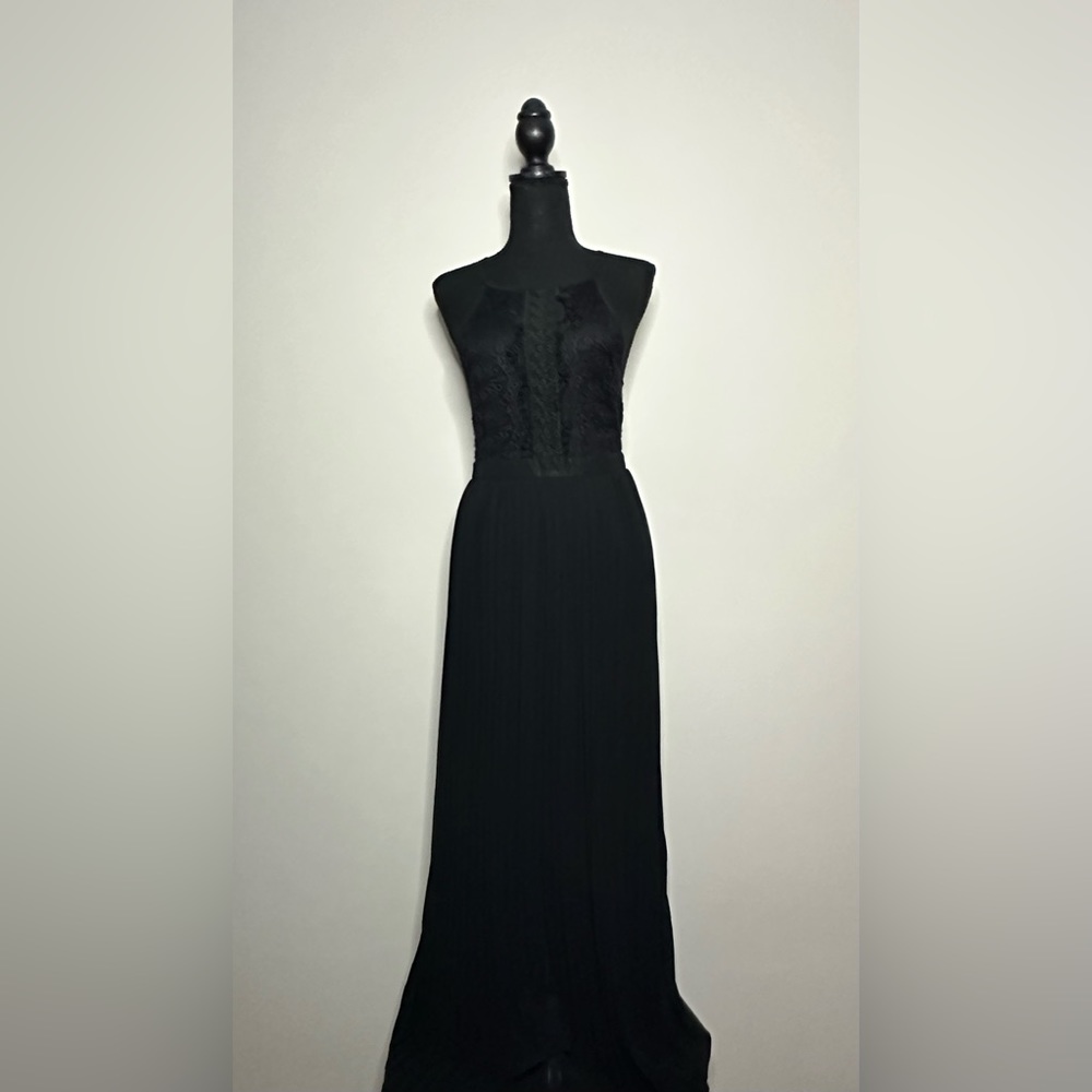Long black dress. New never been worn but it is missing the tag.